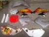 plastic -uri Honda CR 250 cross,far,aripa,panou,aparatori