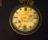 Colier steampunk, pandantiv rotund  (lant lung),culori: bronz, albastru (realizat din piese de ceas prinse in rasina) Unicat