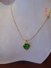 Set placat cu aur de 18k, format din colier si cercei cu cristale smarald heart cut si cristale swarovski clear, bijuterii mireasa