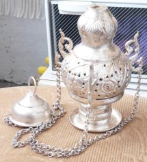 Candela veche , alama argintata , atelier manastiresc foto